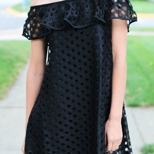 Off  shoulder mini dress.